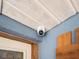Indoor/Outdoor Security Camera mounted in the corner at 7843 Shoupe Rd, Plant City, FL 33565