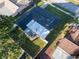 High angle aerial view of the home showcasing its roof and backyard at 811 Helmsman Way, Palm Harbor, FL 34685