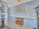 Cozy foyer with tiled floors, neutral paint, and decorative accents at 811 Helmsman Way, Palm Harbor, FL 34685