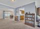 Open-concept living room offers views of dining room and kitchen, with traditional furnishings at 811 Helmsman Way, Palm Harbor, FL 34685