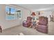 Cozy living room with plush seating and a view to the outside at 811 Helmsman Way, Palm Harbor, FL 34685