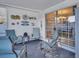 Relaxing outdoor patio area featuring comfortable seating and tranquil setting at 811 Helmsman Way, Palm Harbor, FL 34685