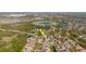 An aerial view shows a well-situated home nestled within a beautiful and Gathering-friendly neighborhood at 8329 Moccasin Trail Dr, Riverview, FL 33578
