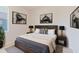 Modern bedroom with stylish decor, comfortable bed, and a window for natural light at 8329 Moccasin Trail Dr, Riverview, FL 33578