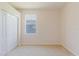 Bedroom with a closet and a window, providing natural light at 8329 Moccasin Trail Dr, Riverview, FL 33578