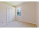 Bedroom with closet and window bringing in natural light at 8329 Moccasin Trail Dr, Riverview, FL 33578