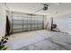 The garage has a large door and lighting at 8329 Moccasin Trail Dr, Riverview, FL 33578