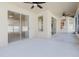 Spacious covered patio features multiple doors and windows to indoors at 8329 Moccasin Trail Dr, Riverview, FL 33578