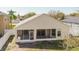 A screened-in lanai provides an outdoor living space at the back of this well-maintained Florida home at 8329 Moccasin Trail Dr, Riverview, FL 33578