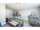Basement features tile cutter and other tools; ready for your next project at 101 Sunlit Cove Ne Dr, St Petersburg, FL 33702