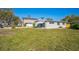 This charming home boasts a well-maintained lawn and a cozy, inviting exterior, perfect for comfortable living at 101 Sunlit Cove Ne Dr, St Petersburg, FL 33702