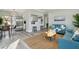 Open-concept living space featuring a modern design, stylish furnishings and lots of light at 101 Sunlit Cove Ne Dr, St Petersburg, FL 33702