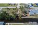 An aerial perspective of a property with a boat dock and canal access at 1019 Canal St, Ruskin, FL 33570