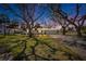 Charming single-story home featuring a mature landscaped yard with beautiful trees and a private driveway at 1019 Canal St, Ruskin, FL 33570