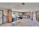 Unfinished room featuring tile flooring, a window with exterior view, and exposed studs at 1019 Canal St, Ruskin, FL 33570