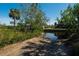 Direct water access with lush greenery for privacy and convenience at 1019 Canal St, Ruskin, FL 33570