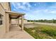Backyard with a basketball court and a covered patio, perfect for recreation and outdoor living at 10909 Observatory Way, Tampa, FL 33647