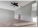 Spacious bedroom features carpet and vaulted ceilings and is filled with natural light at 10909 Observatory Way, Tampa, FL 33647