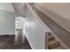 View of neutral staircase from living area at 10909 Observatory Way, Tampa, FL 33647