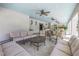 Cozy clubhouse lounge area with ample seating and ceiling fans at 1109 Lady Gouldian Ct, Tampa, FL 33613