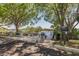 Community dock and water access point, surrounded by green trees and lush foliage at 1204 Blackrush Dr, Tarpon Springs, FL 34689