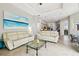 Inviting living room with neutral tones and tile flooring, perfect for gatherings at 1204 Blackrush Dr, Tarpon Springs, FL 34689