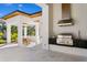 An outdoor kitchen features stainless steel appliances under a covered patio at 1401 Brightwaters Ne Blvd, St Petersburg, FL 33704