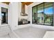 This outdoor kitchen features stainless steel grill, modern vent hood, and countertop space at 1401 Brightwaters Ne Blvd, St Petersburg, FL 33704