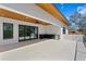 Large outdoor terrace featuring a full outdoor kitchen, tile floors and views of the surrounding neighborhood at 1401 Brightwaters Ne Blvd, St Petersburg, FL 33704