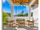 Inviting outdoor seating area features comfortable seating and a ceiling fan at 1401 Brightwaters Ne Blvd, St Petersburg, FL 33704