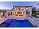 Luxury backyard with a modern pool, outdoor kitchen, and spacious patio area perfect for entertaining at 1401 Brightwaters Ne Blvd, St Petersburg, FL 33704