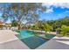 Stunning pool surrounded by tile patio offering a luxurious outdoor experience at 1401 Brightwaters Ne Blvd, St Petersburg, FL 33704