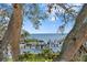 Picturesque waterfront view showcasing a boat dock and the serene expanse of the ocean at 1401 Brightwaters Ne Blvd, St Petersburg, FL 33704