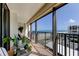 Enjoy the view of the ocean from this lovely balcony with comfortable chairs and plants at 1460 Gulf Blvd # 506, Clearwater Beach, FL 33767