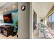 A bright, covered balcony extends from the living room, creating an inviting indoor-outdoor space at 1460 Gulf Blvd # 506, Clearwater Beach, FL 33767