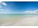 Serene beach scene with calm waters and soft sand, perfect for a relaxing day by the sea at 1460 Gulf Blvd # 506, Clearwater Beach, FL 33767