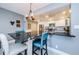 Bright kitchen featuring modern stainless steel appliances and a stone breakfast bar with seating at 1460 Gulf Blvd # 506, Clearwater Beach, FL 33767