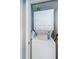 Cozy laundry room with stacked washer and dryer units at 1460 Gulf Blvd # 506, Clearwater Beach, FL 33767