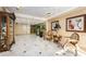 Elegantly decorated lobby with tiled floor, seating area, and decorative display cabinet at 1460 Gulf Blvd # 506, Clearwater Beach, FL 33767