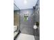 Modern tiled shower with built-in niche for toiletries at 1460 Gulf Blvd # 506, Clearwater Beach, FL 33767