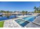 Waterfront pool and spa with boat dock perfect for entertaining and enjoying the Florida lifestyle at 1467 52Nd Ne Ave, St Petersburg, FL 33703