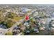 Aerial view of property showcasing location on canal with easy access to water and nearby amenities at 1772 Indian Rocks S Rd, Largo, FL 33774