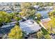 Aerial view of a beautiful home with a spacious backyard, swimming pool, and boat dock at 1772 Indian Rocks S Rd, Largo, FL 33774