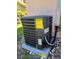 Exterior shot of the home's energy-efficient air conditioning unit at 1772 Indian Rocks S Rd, Largo, FL 33774