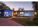 Charming single-story home with well-manicured lawn and inviting front entrance at 1772 Indian Rocks S Rd, Largo, FL 33774