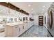 Modern, updated kitchen with a large island, stainless steel appliances, and ample counter space at 1772 Indian Rocks S Rd, Largo, FL 33774