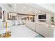 Bright, open-concept living area with modern finishes and seamless flow to the kitchen at 1772 Indian Rocks S Rd, Largo, FL 33774
