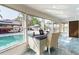 Bright office space with a pool view through the large windows at 1772 Indian Rocks S Rd, Largo, FL 33774