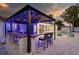 This home has a cool backyard bar with blue LED lighting overlooking the pool at 1772 Indian Rocks S Rd, Largo, FL 33774