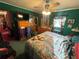 Relaxing bedroom provides ample storage with its dresser and closet, plus plenty of natural light at 18401 Hamilton Rd, Dade City, FL 33523